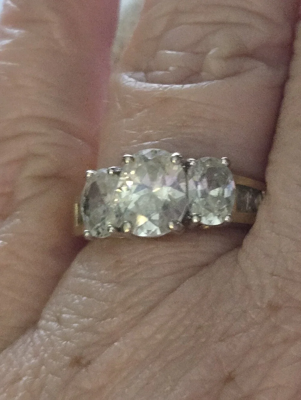 Three-Stone White Cubic Zirconia Ring in Gold-Tone Setting